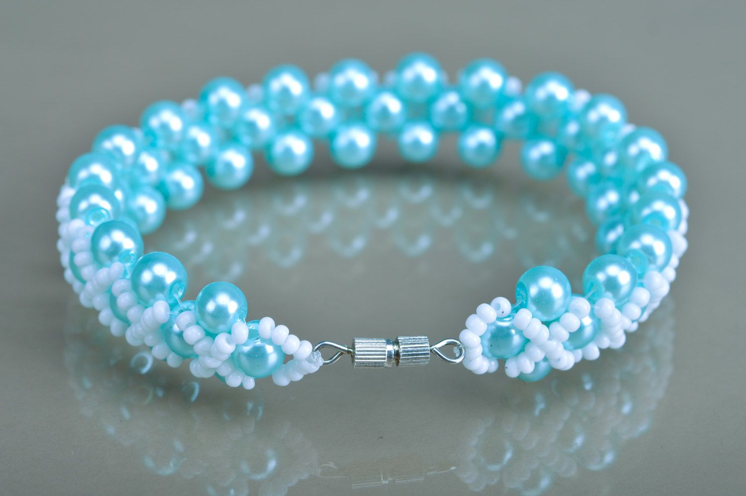 Beautiful handmade wrist bracelet woven of white and blue beads for girls photo 5