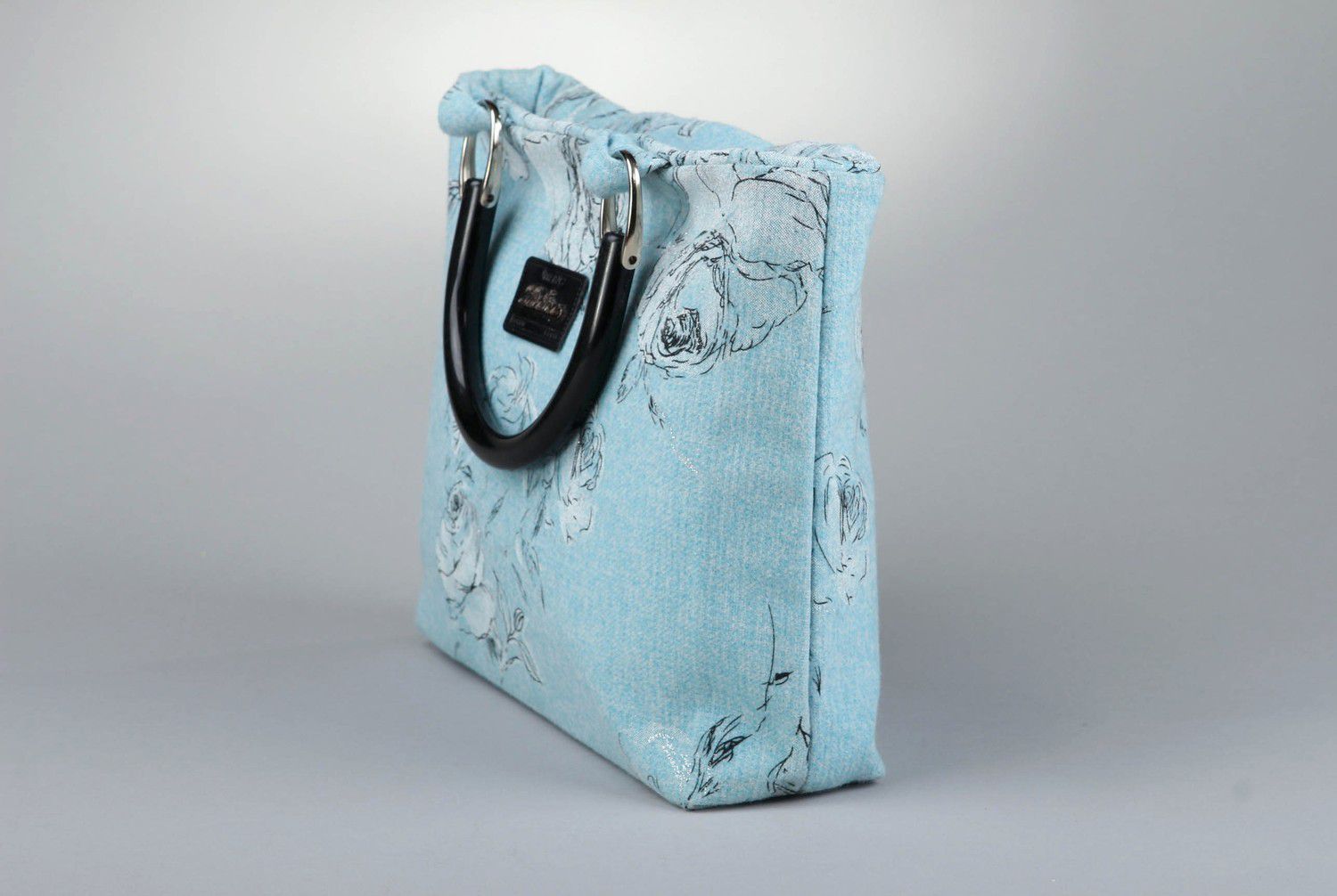 Handgemachte blaue Handtasche aus Textil foto 3