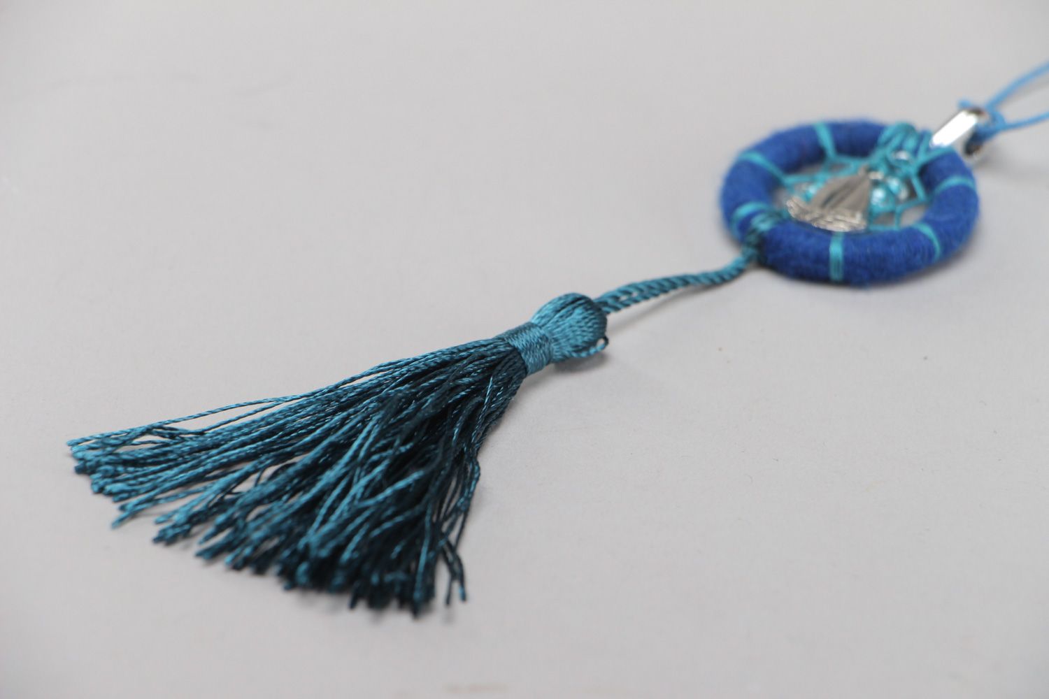 Handmade Native American dreamcatcher pendant necklace in blue color with tassel photo 3