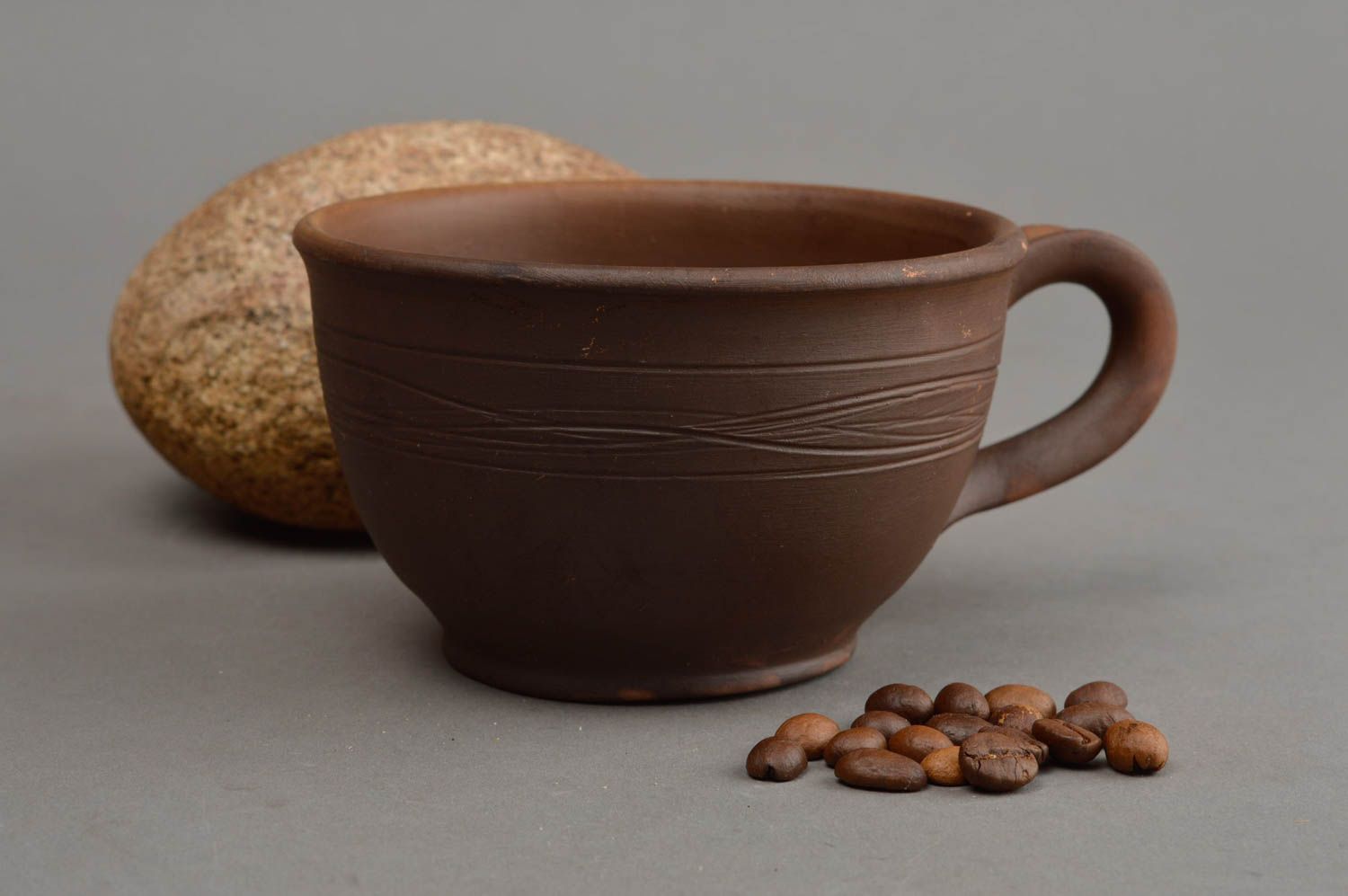 Brown wide ceramic wide coffee cup in rustic plain design with handle photo 1