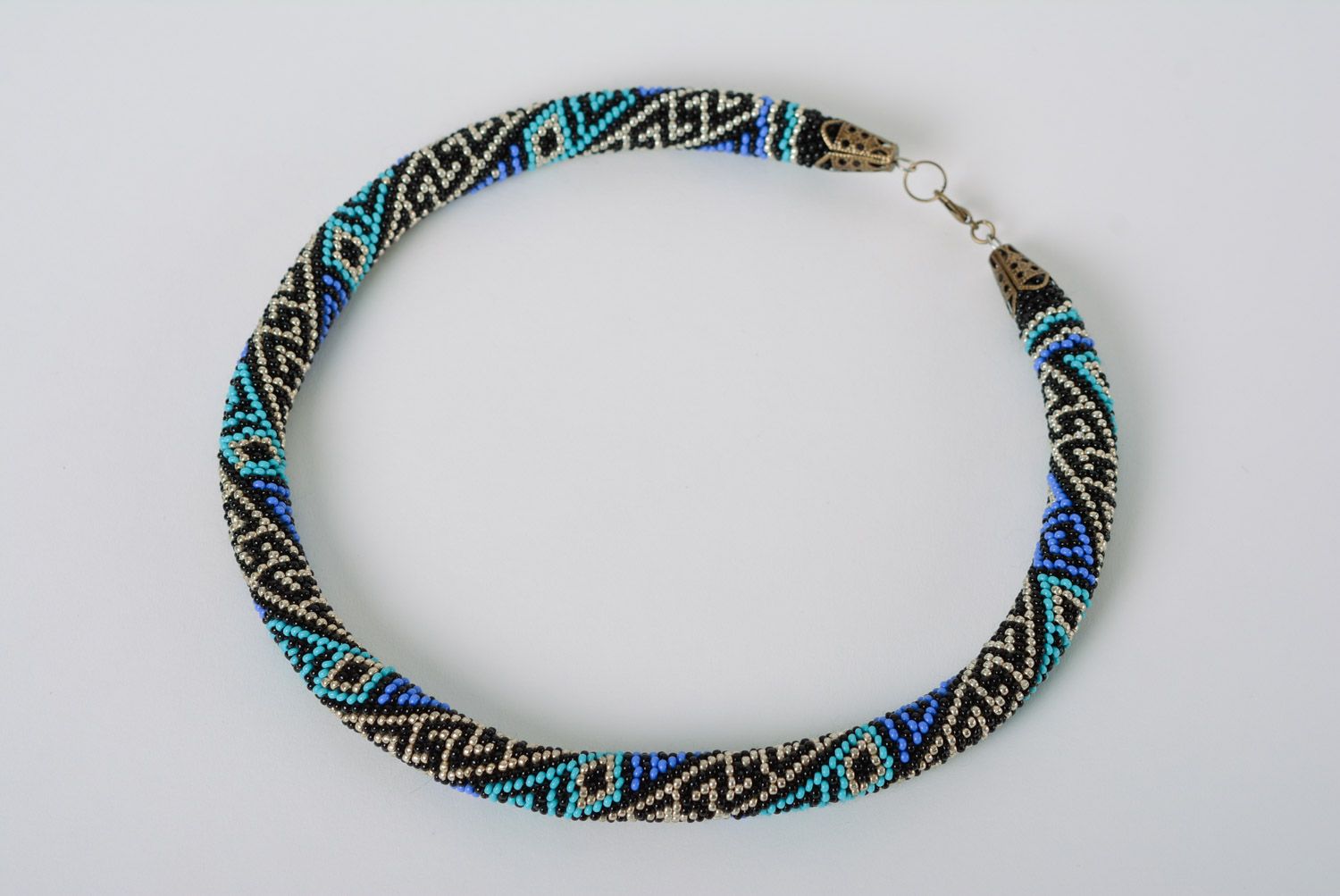 Evening handmade cord necklace woven of beads with ornament in blue color palette photo 2