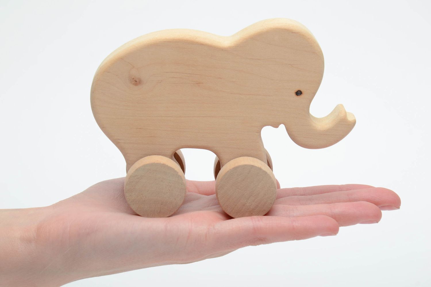 Children's wooden wheeled toy elephant photo 5