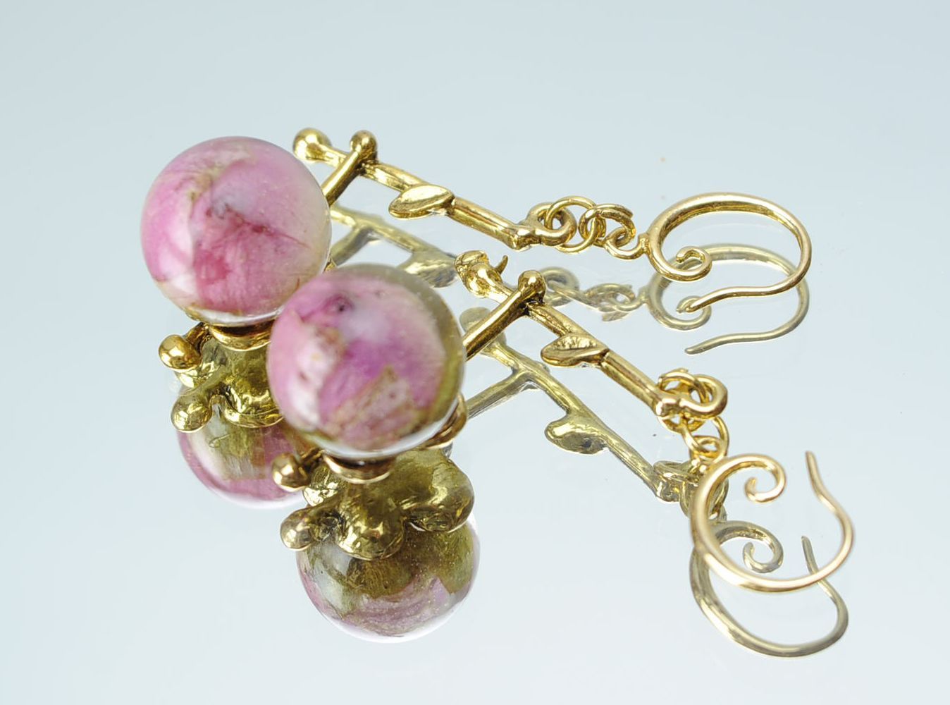 Golden earrings made from buds of the roses photo 1
