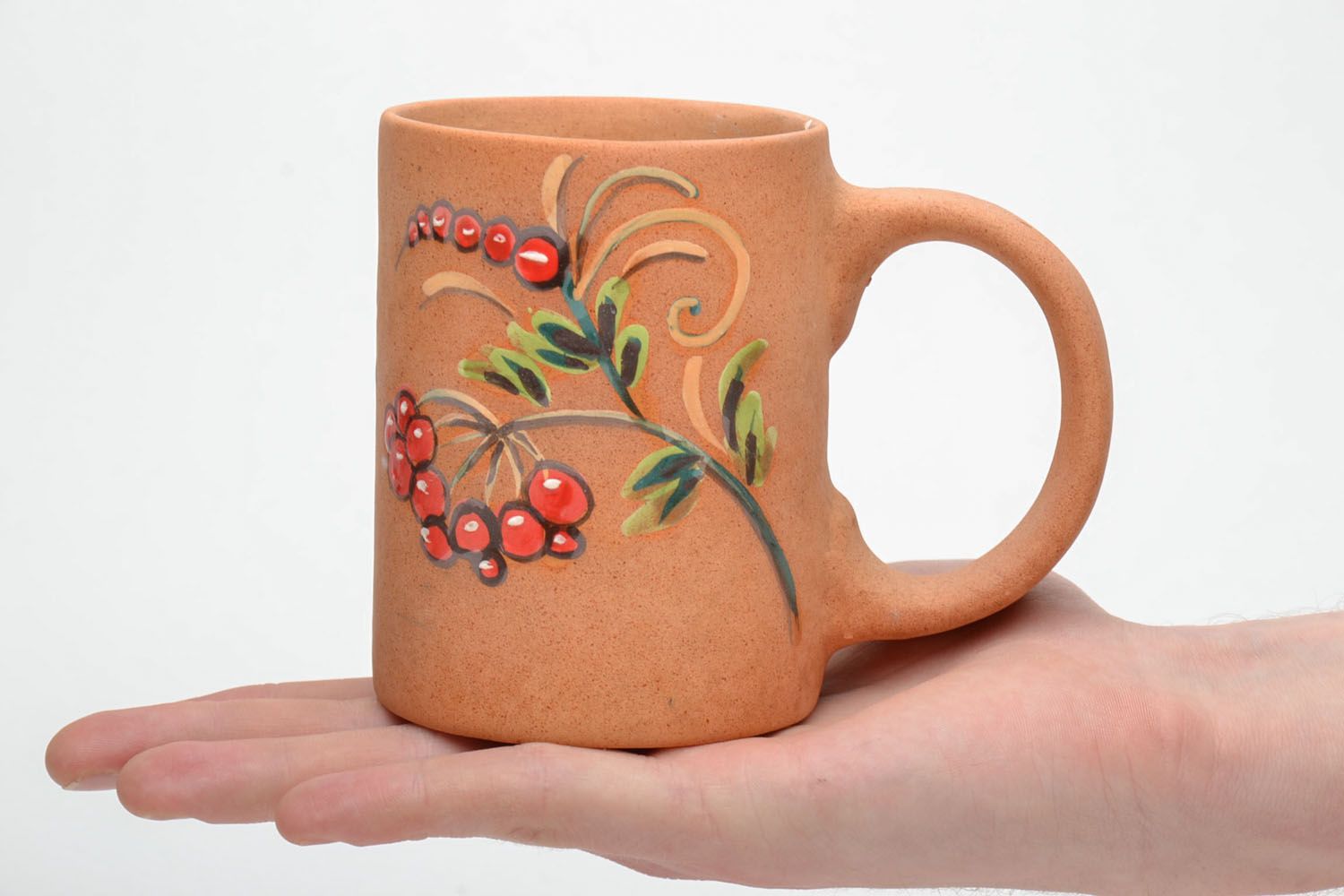 Handmade natural clay glazed coffee mug with handle and hand-painted floral pattern photo 5