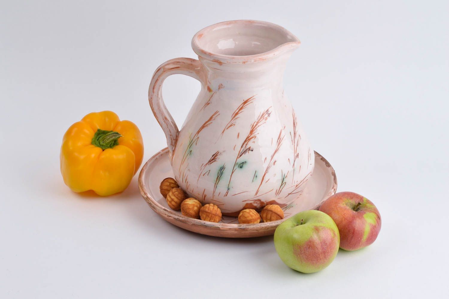 Jarro de cerámica artesanal y platillo decoración de cocina elemento decorativo foto 1