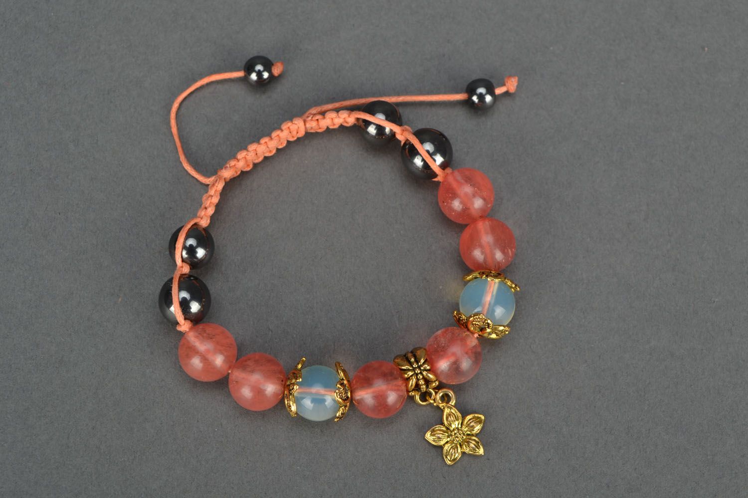 Handmade bracelet with beads and charms photo 2