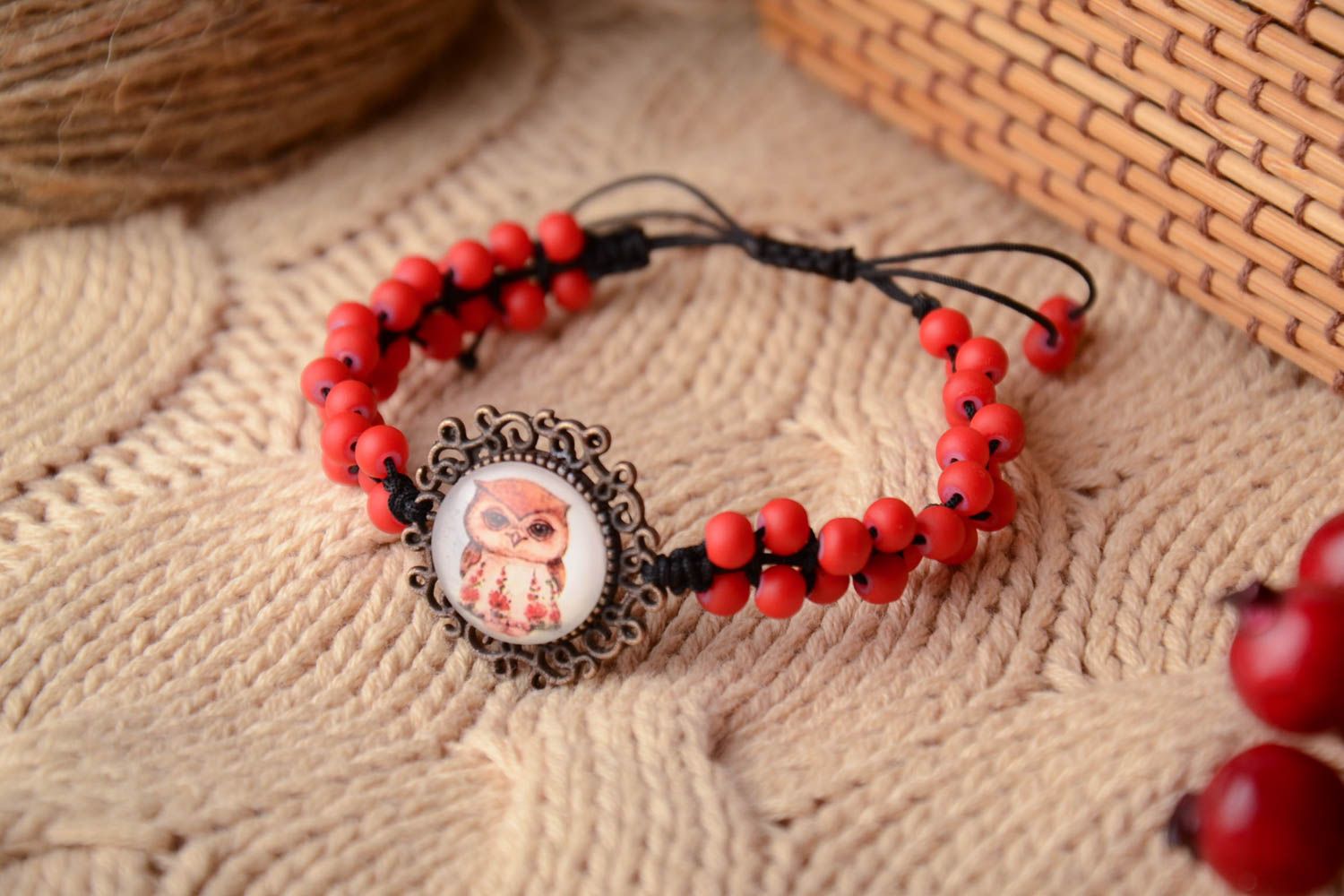Red bracelet woven of beads photo 1