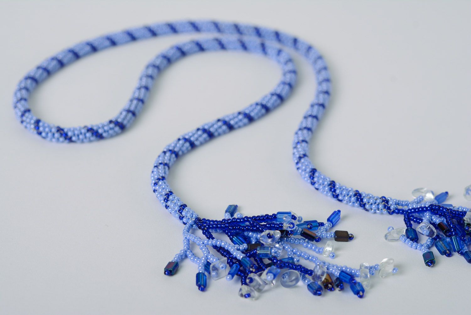 Handmade beautiful long necklace woven of beads in blue color palette for women photo 5