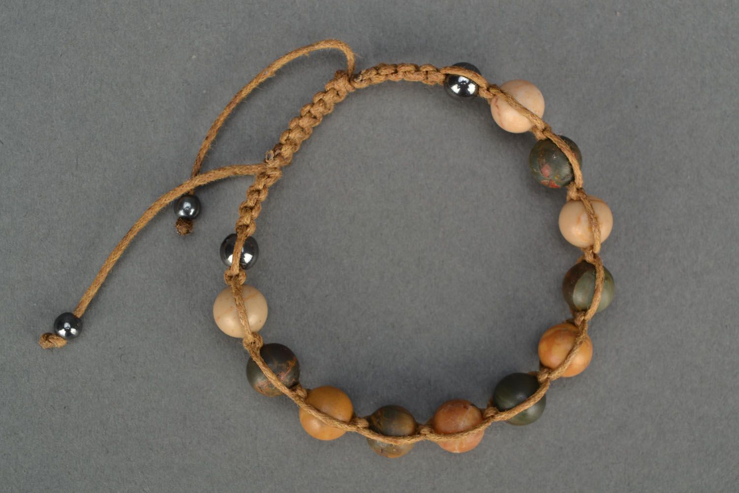 Bracelet with beads and cord photo 2