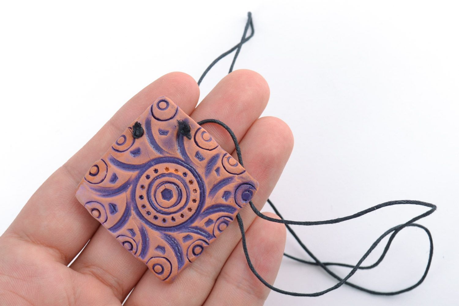 Handmade women's ceramic pendant with ornaments painted with blue acrylics photo 2