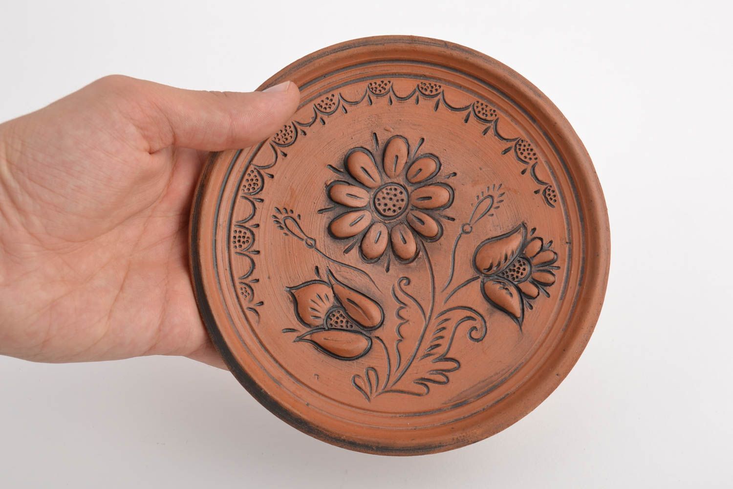 Handmade decorative ceramic wall plate with relief flower image kilned with milk photo 5