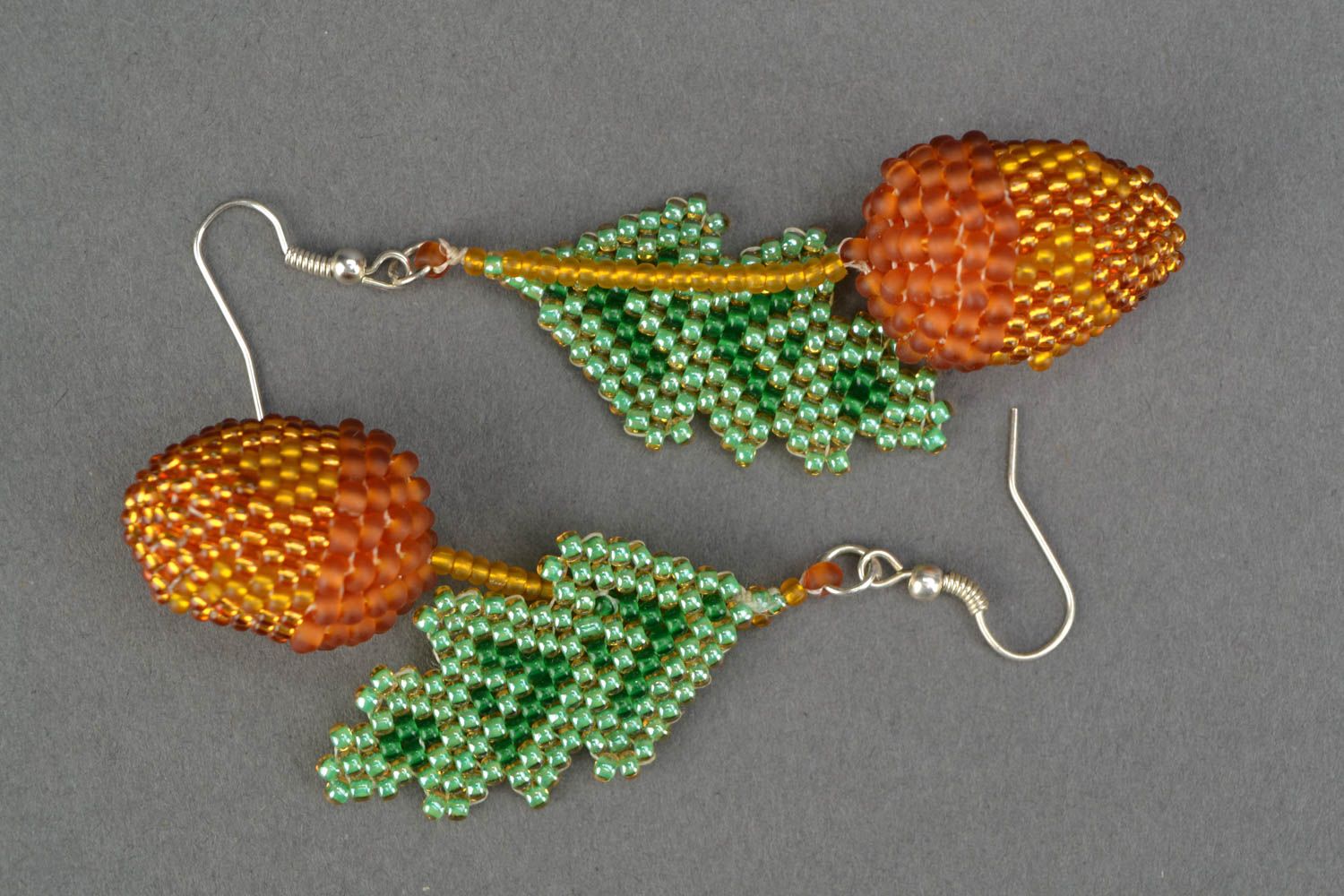 Beaded earrings with acorn charms photo 3