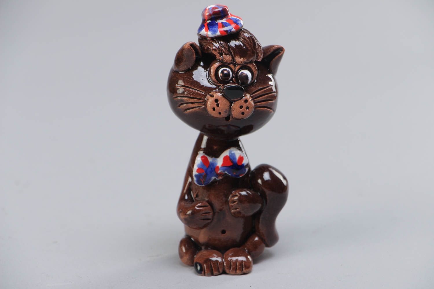 Handmade collectible painted ceramic miniature figurine of cat of brown color  photo 2