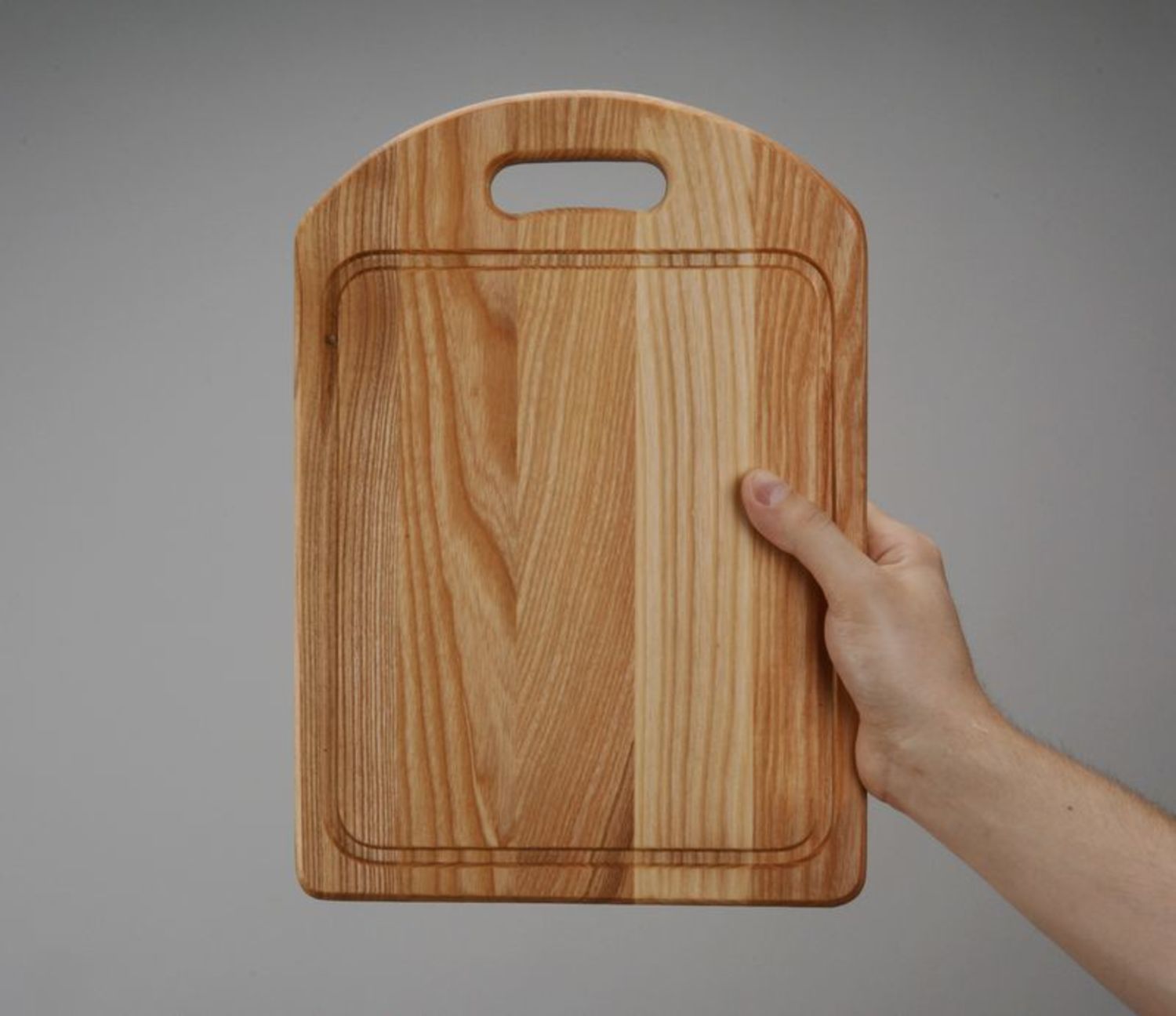 A wooden cutting board photo 2