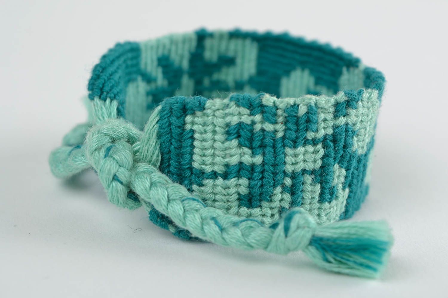 Handmade designer macrame woven wrist bracelet of turquoise color for women photo 4