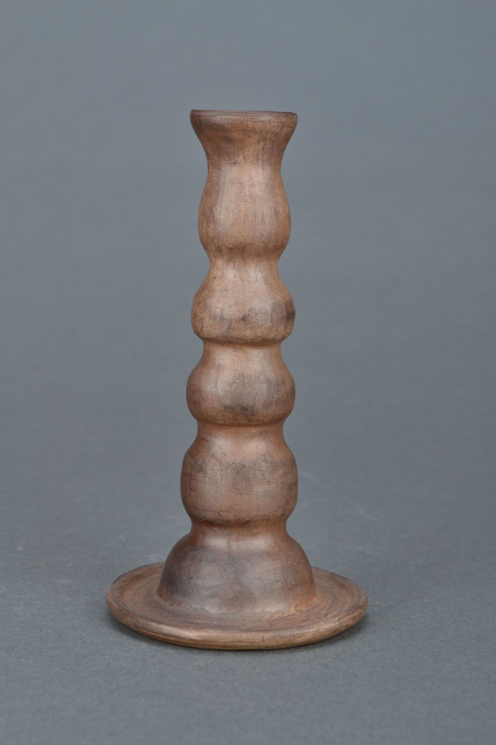 Clay candlestick made using milk firing technique photo 3