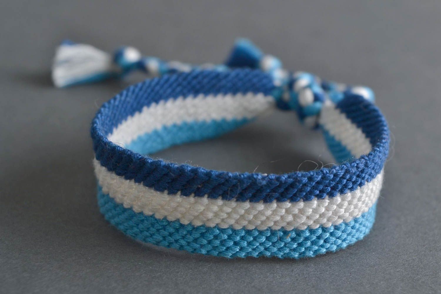 Handmade three color friendship bracelet made of floss threads stylish accessory photo 1