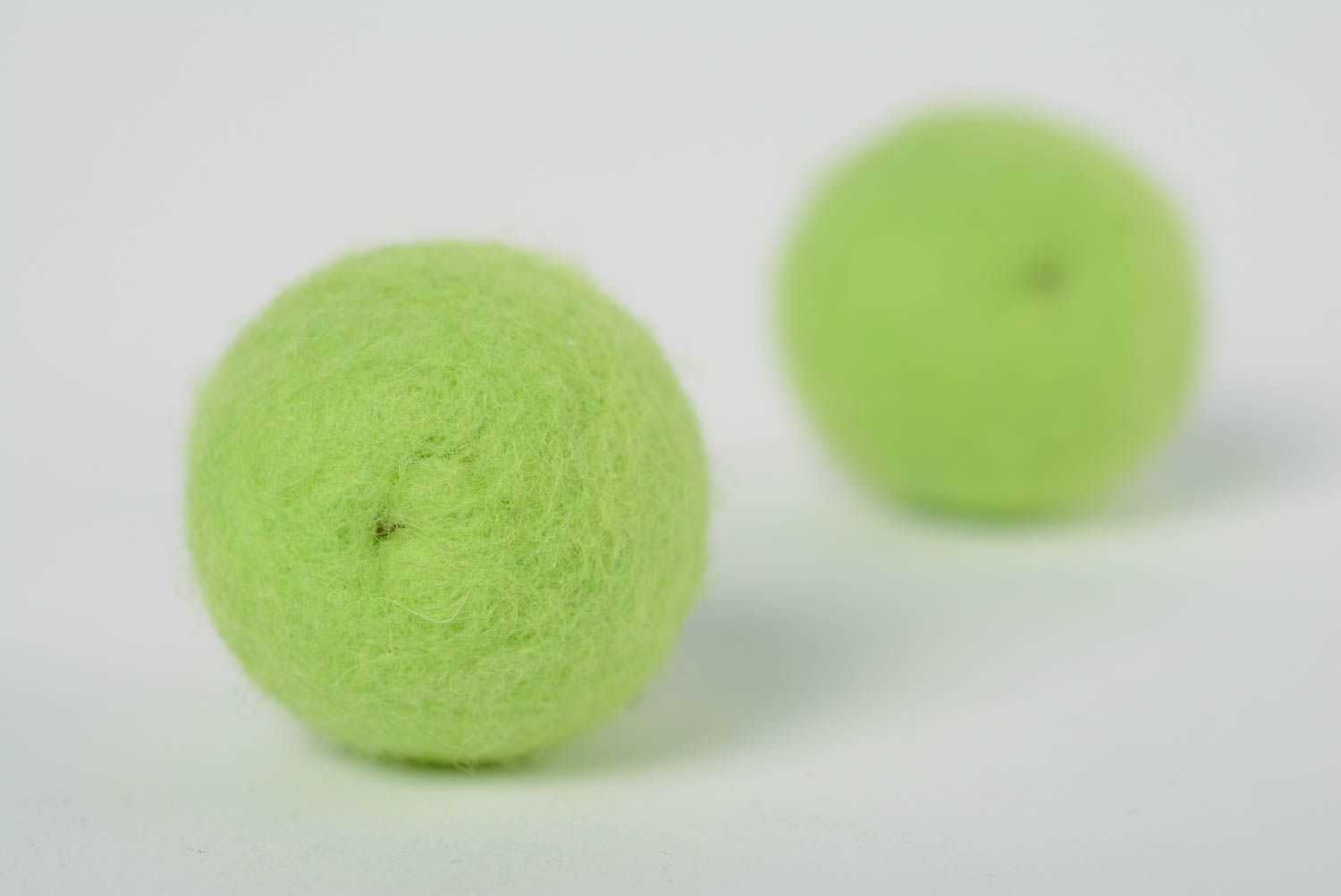 Handmade ball shaped dangling earrings felted of wool of light green color photo 5