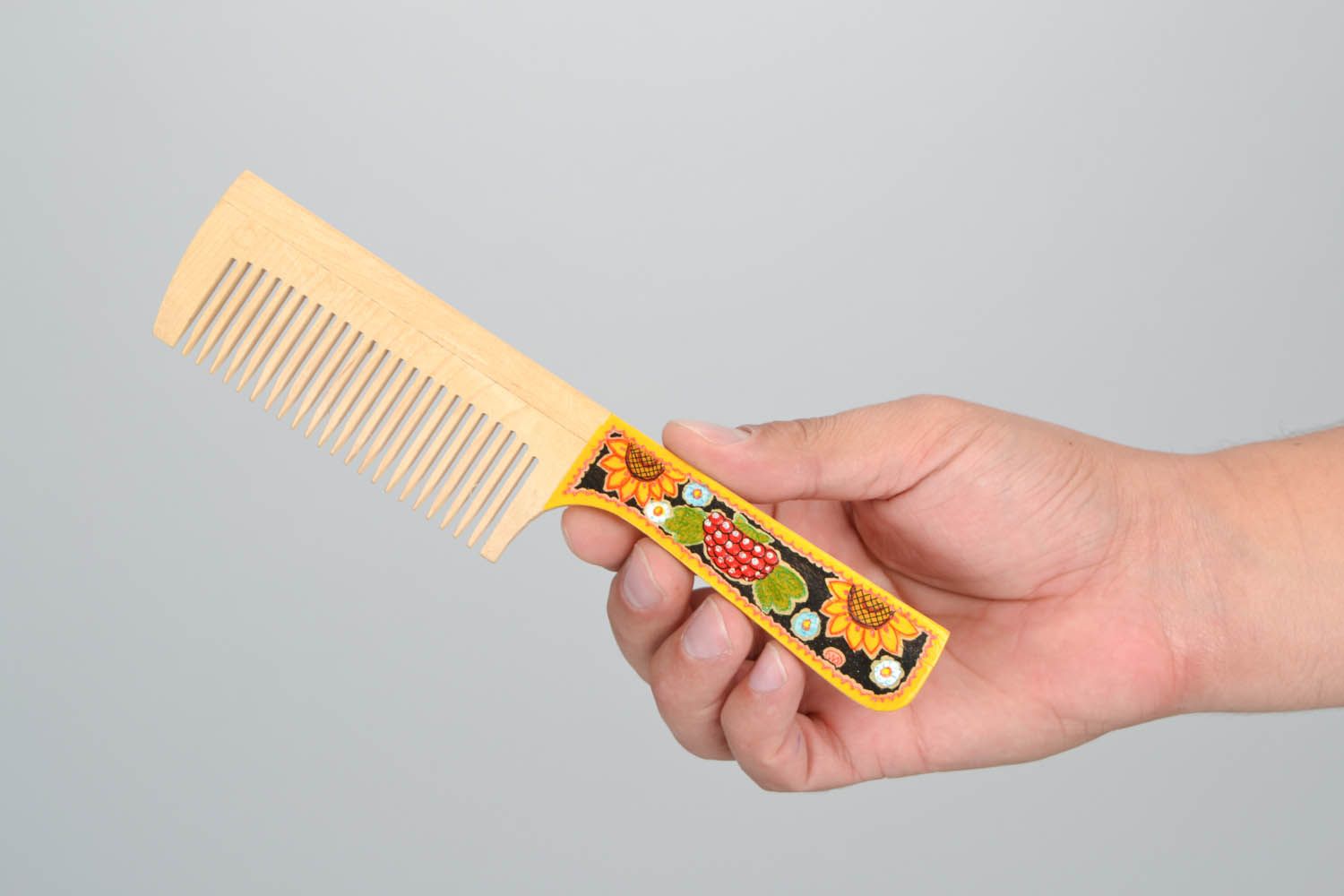 Comb with painted handle photo 2