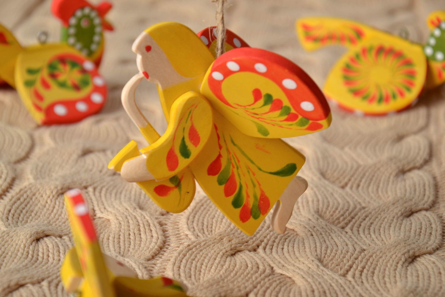 Handmade wooden toy with Ukrainian ethnic painting Angel with Saxophone photo 1