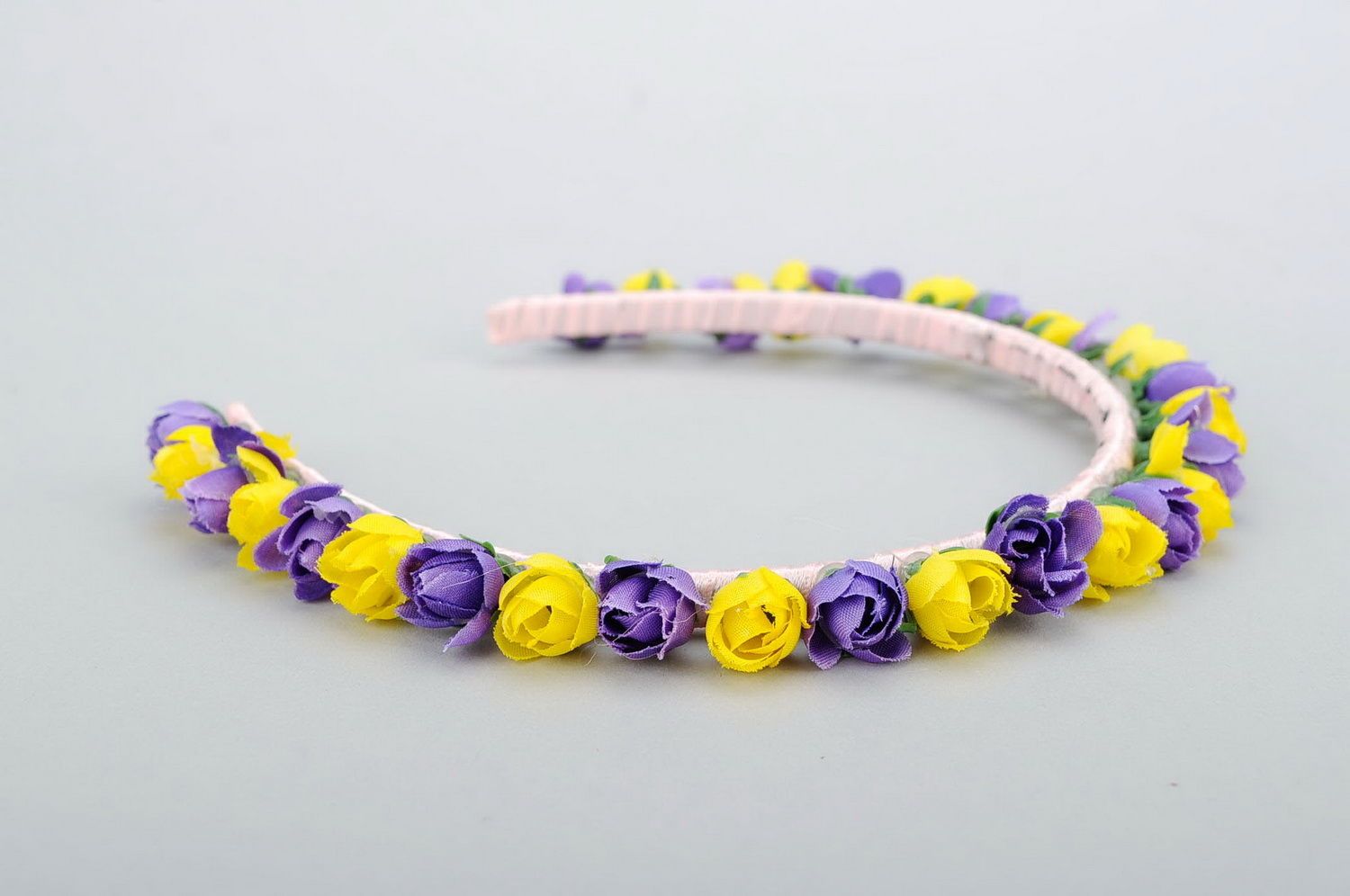 Headband with purple and yellow flowers photo 1