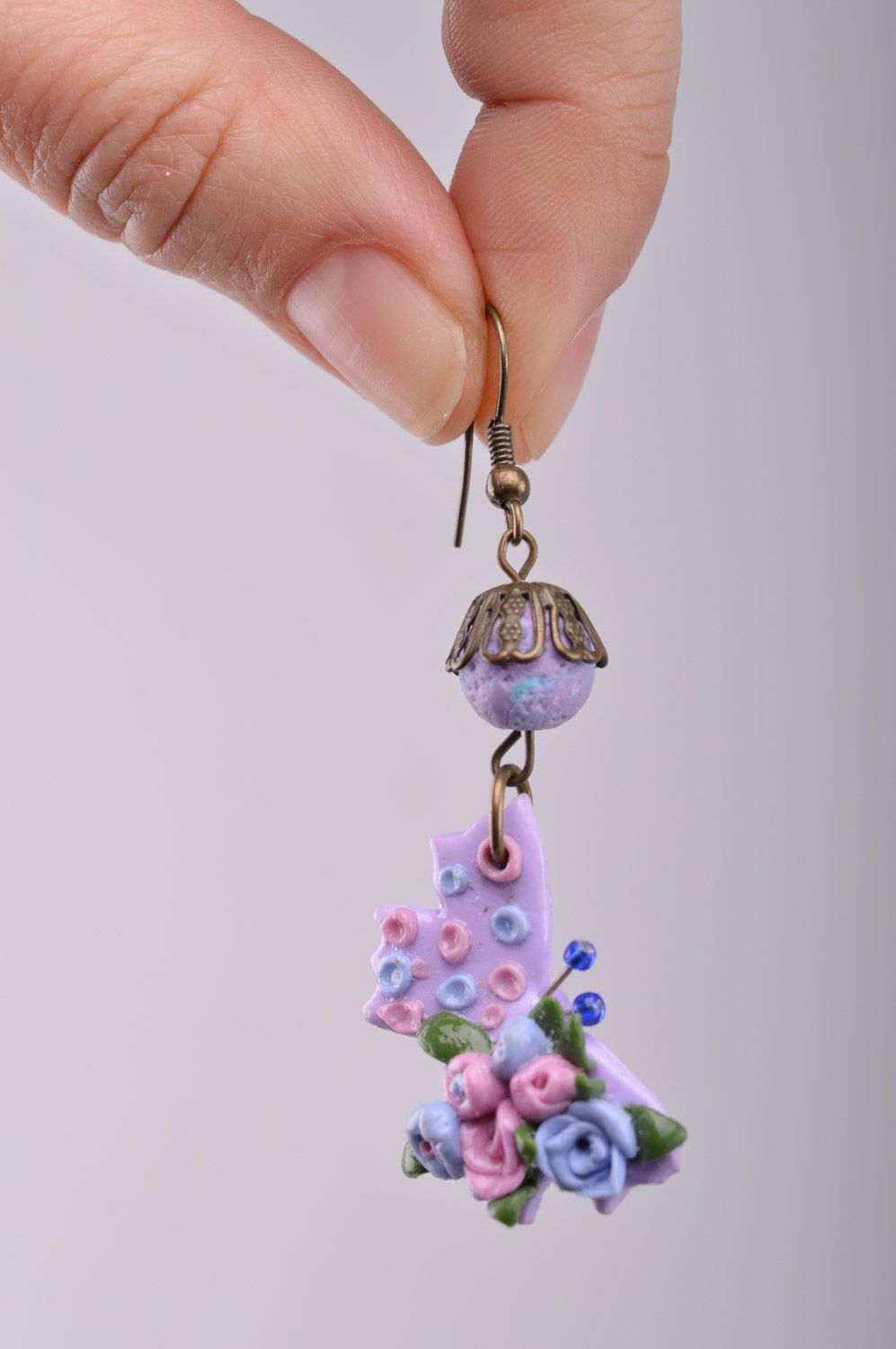 Gentle handmade women's polymer clay bow earrings with flowers of lilac color photo 1