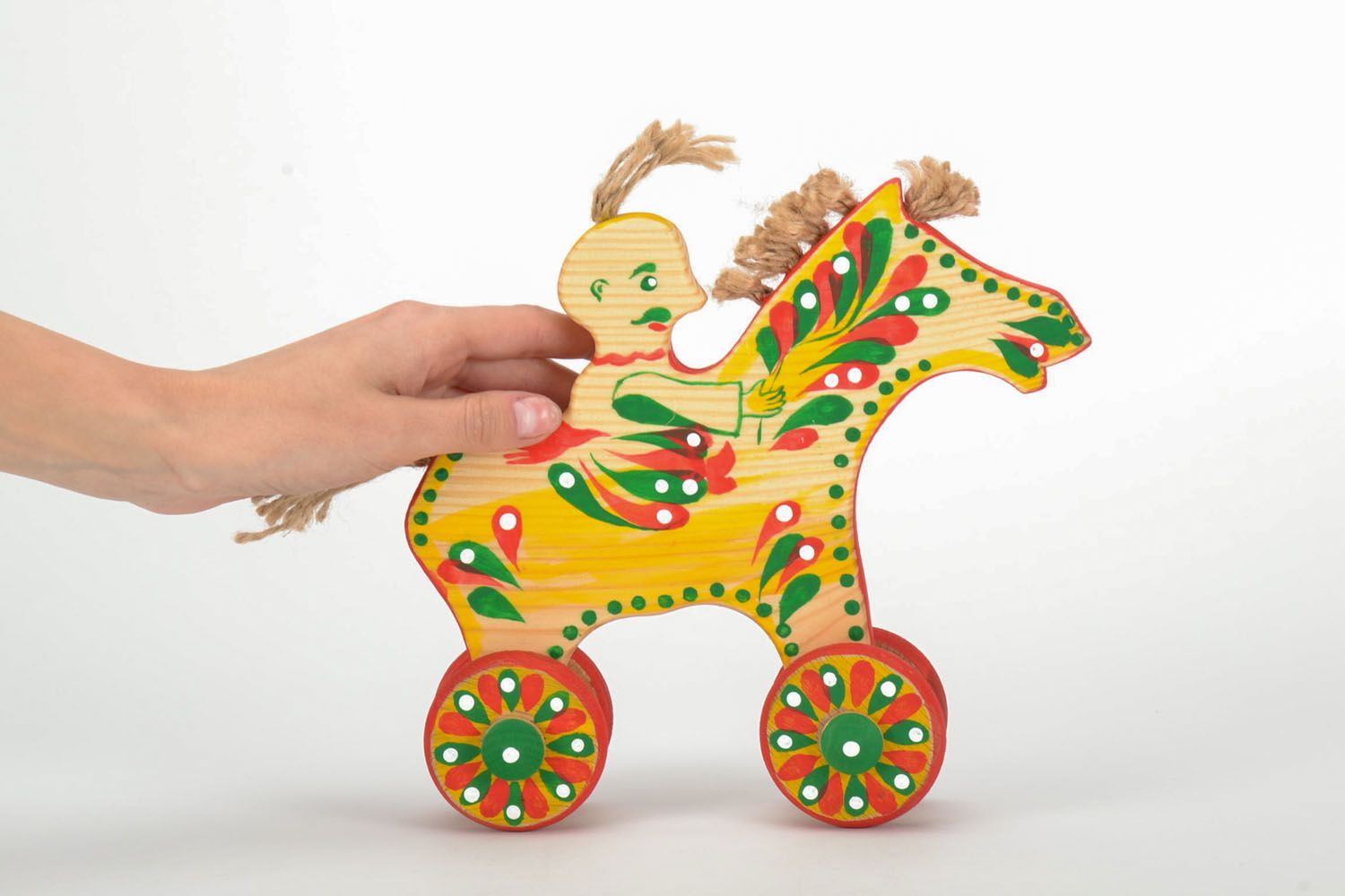 Brinquedo em rodas de madeira Cossaco  foto 5