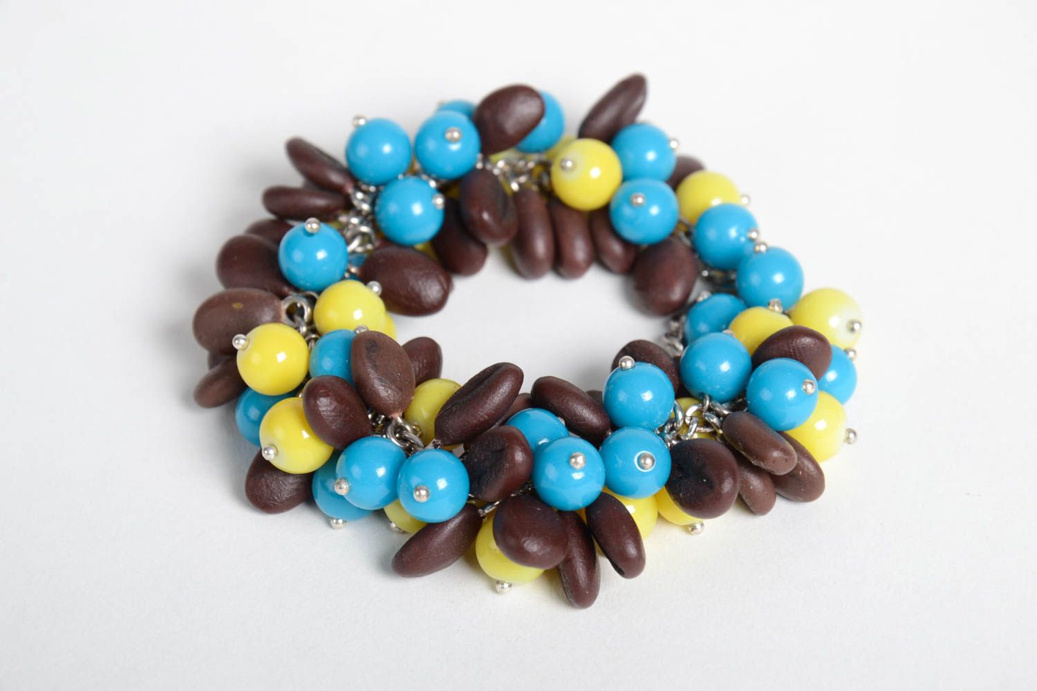 Multiple blue, yellow, brown beads charm bracelet  photo 1