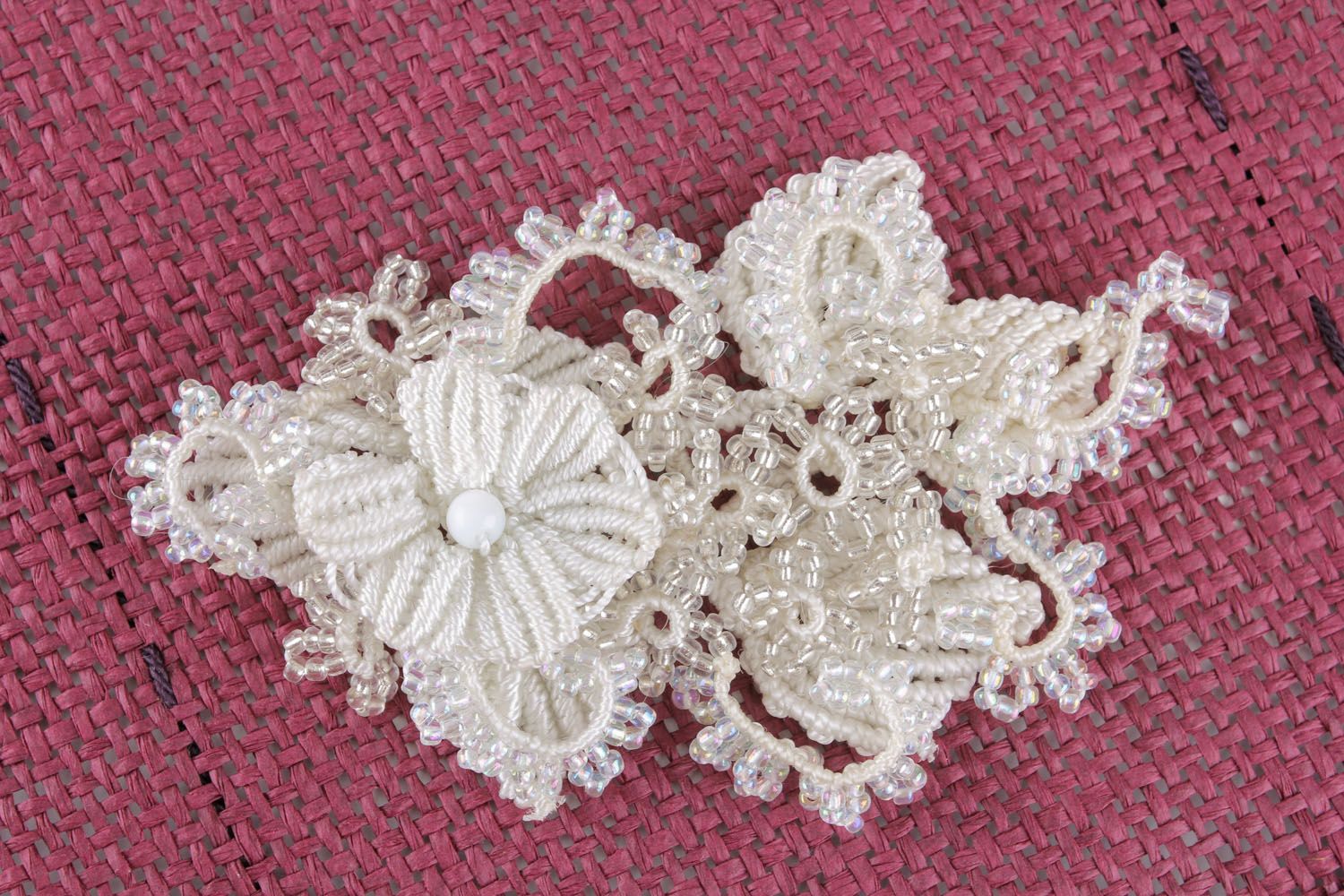 White brooch made of threads and beads photo 3