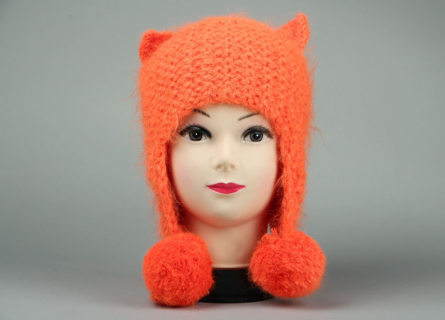 Knitted hat with pom poms, orange hat photo 1