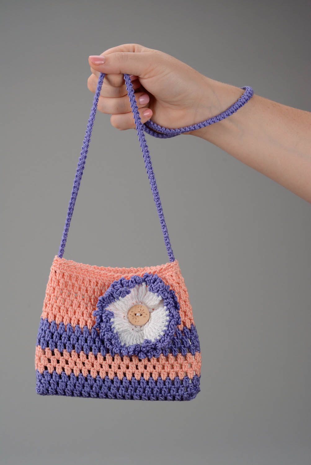 Crocheted baby purse with flower photo 1
