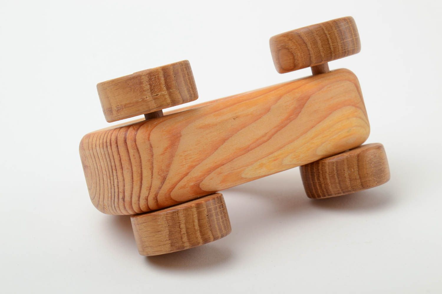 Handmade small eco friendly wooden wheeled toy coated with linen oil for kids photo 5