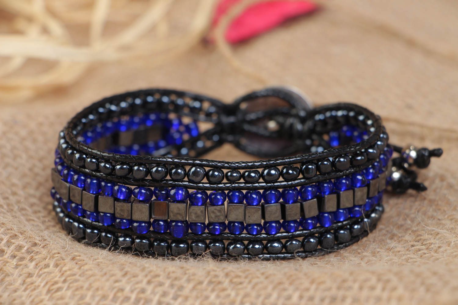 Unusual festive black and blue handmade gemstone beaded wrist bracelet photo 1