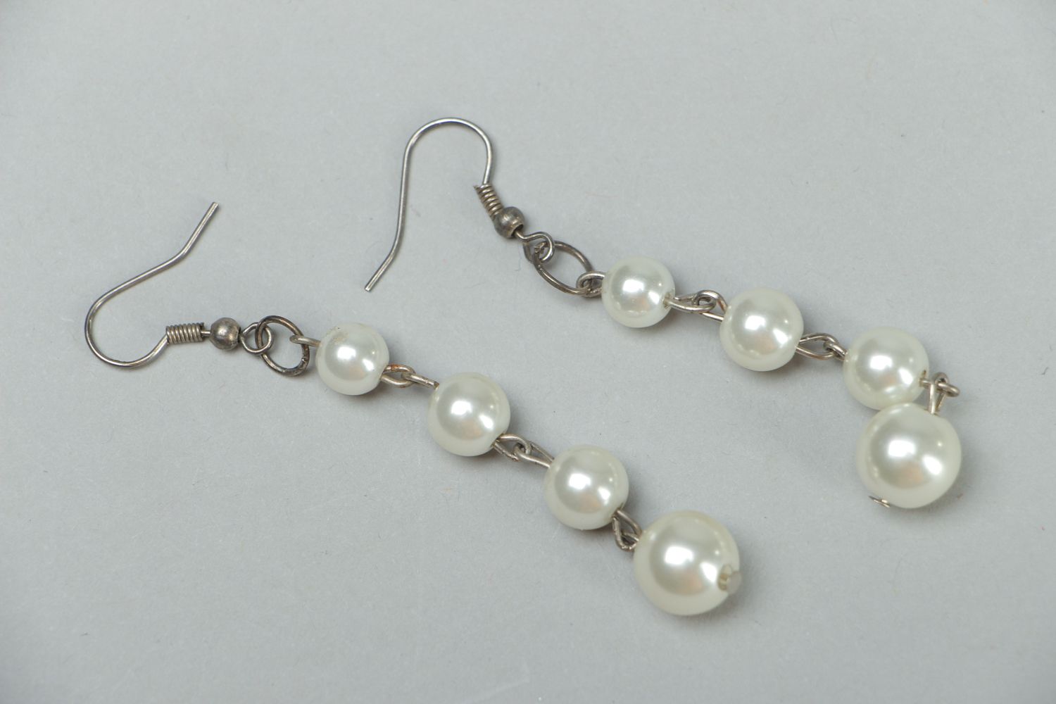 Earrings with pearl-like beads photo 1