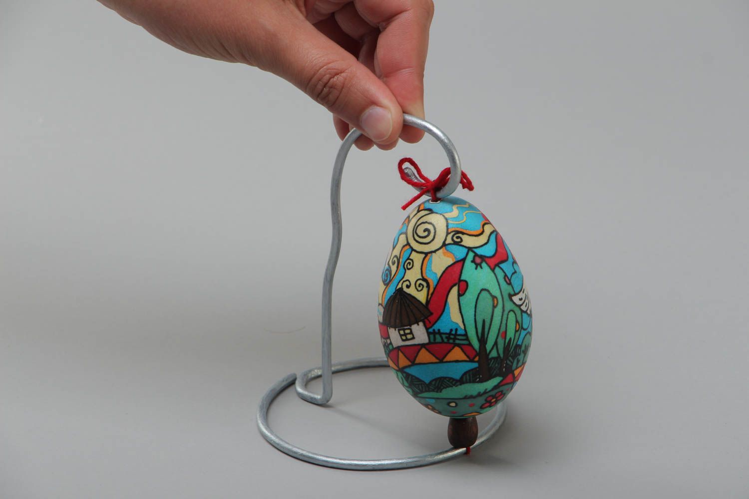 Handmade decorative colorful painted Easter goose egg with metal stand photo 5
