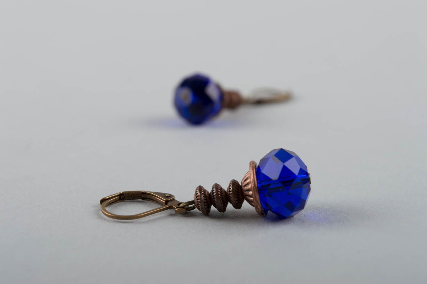 Unusual beautiful elegant handmade brass earrings with crystals of blue color photo 5