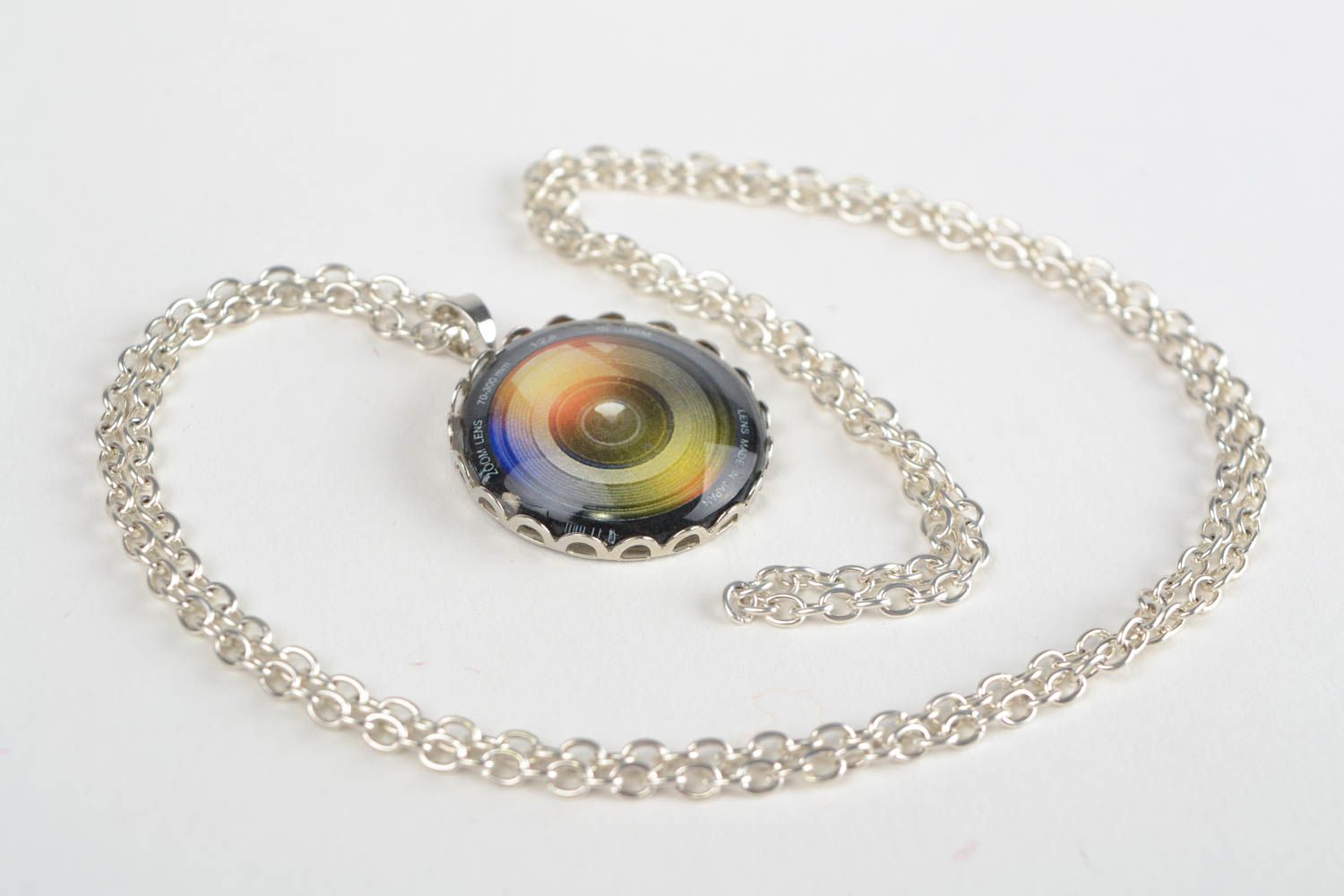 Beautiful handmade designer glass neck pendant on chain with the image of lens photo 1