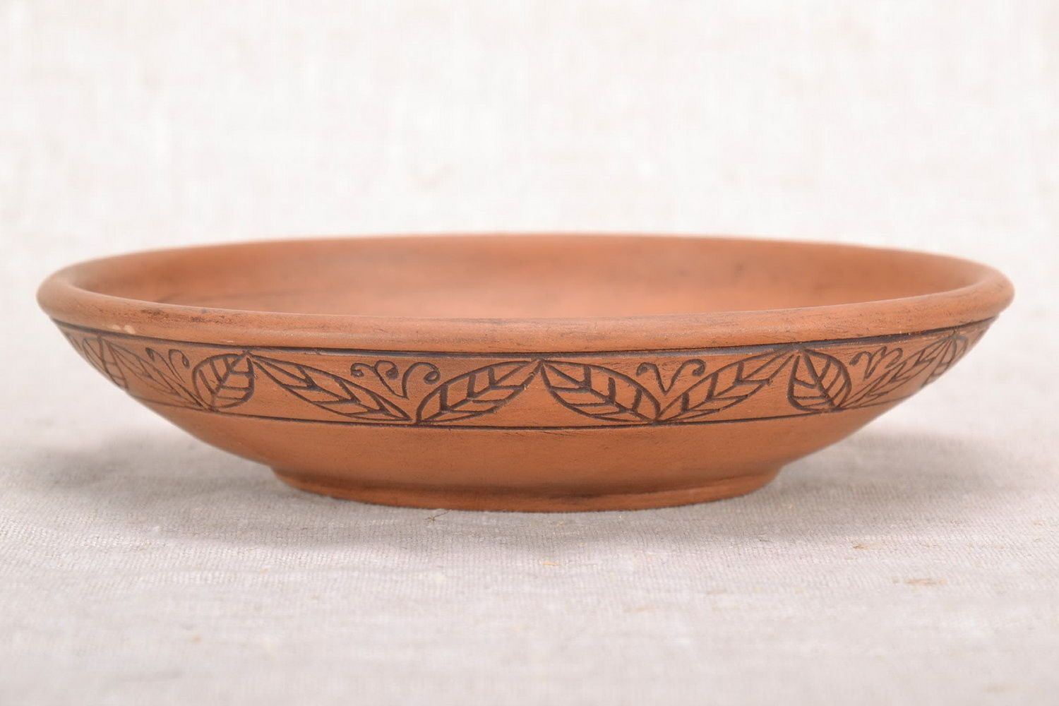 Clay bowl with ornament photo 2