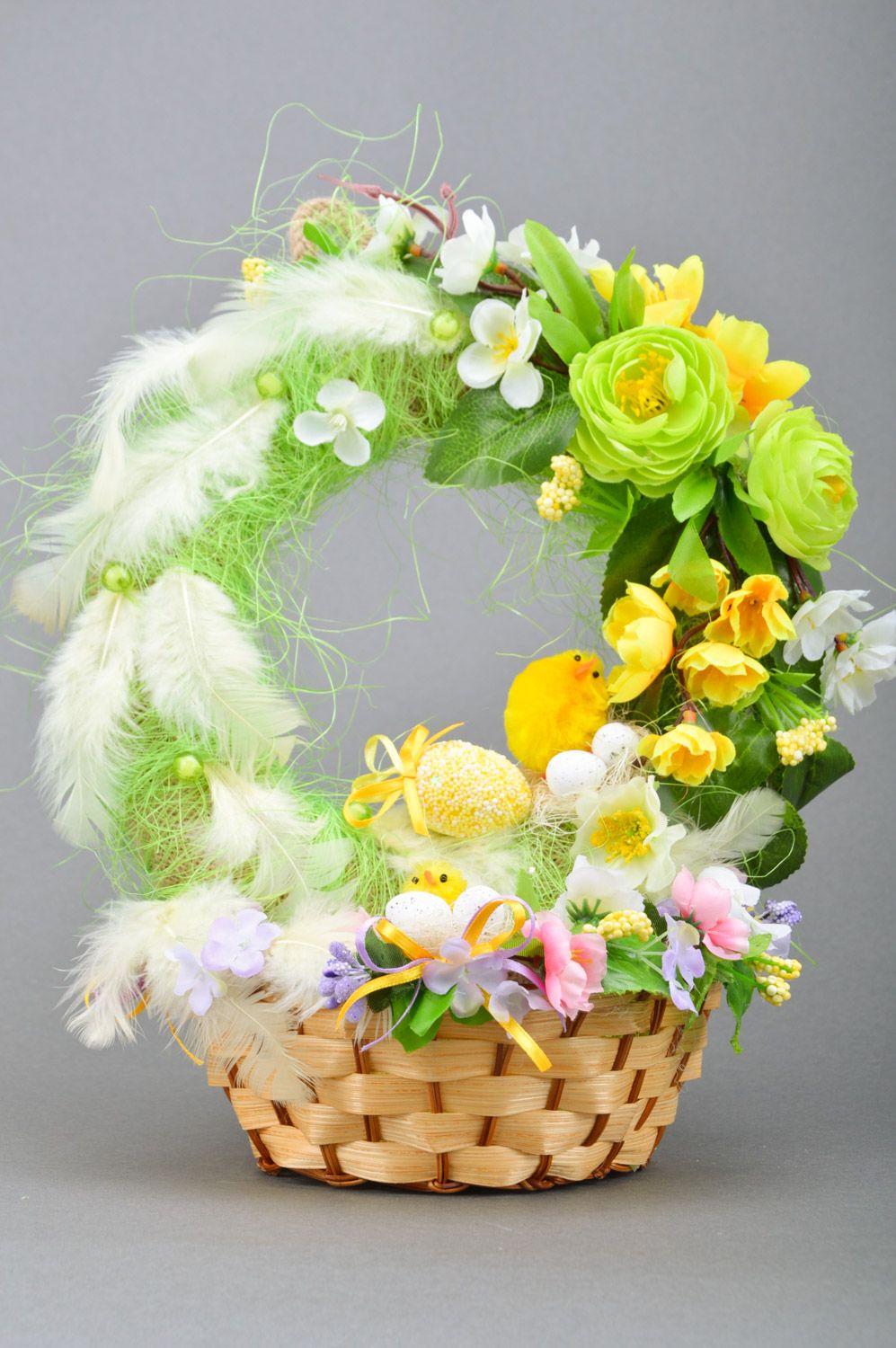 Easter composition made of wicker handmade basket and wreath for home decor photo 5