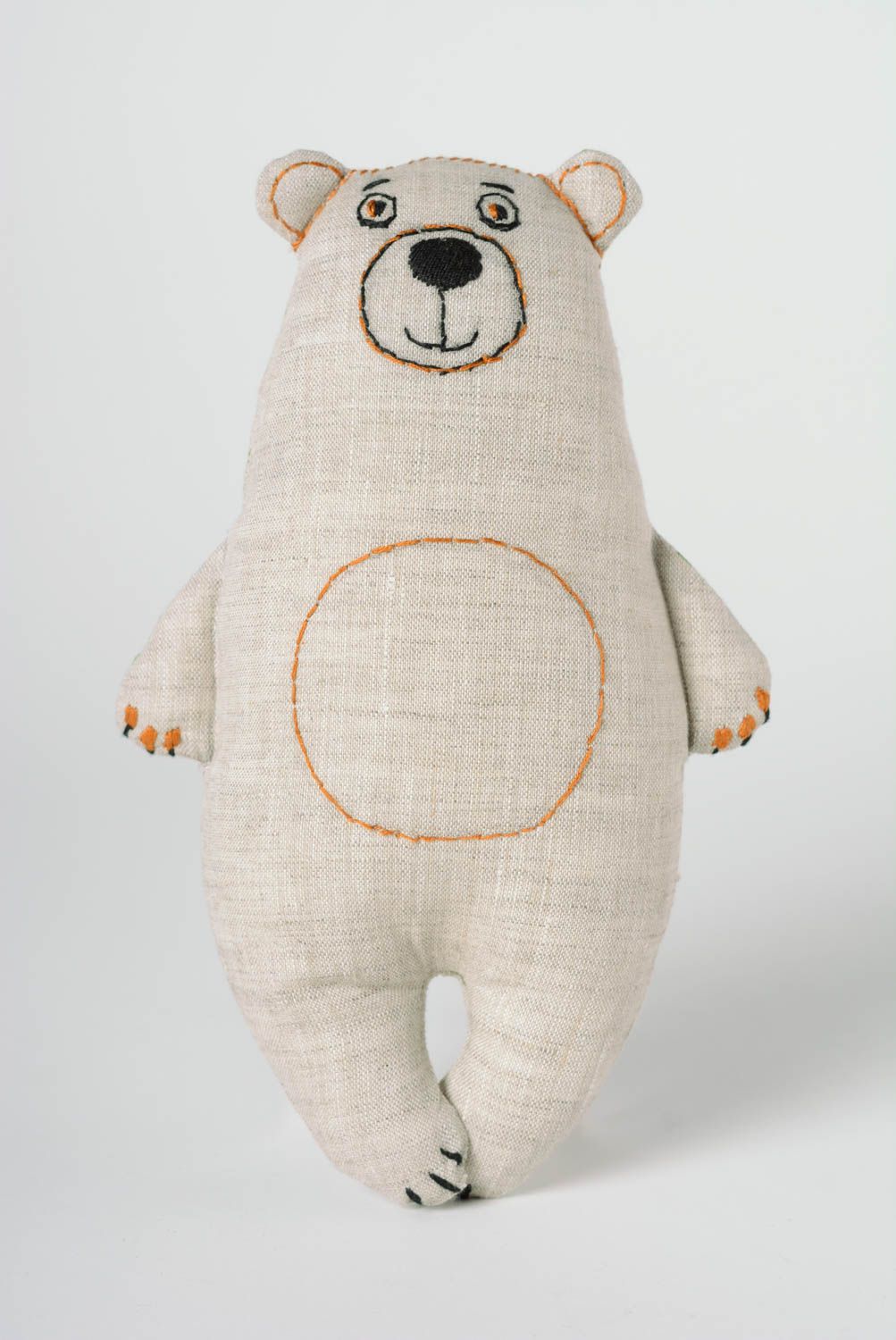 Handmade soft toy bear sewn of one colored and patterned linen with embroidery photo 1