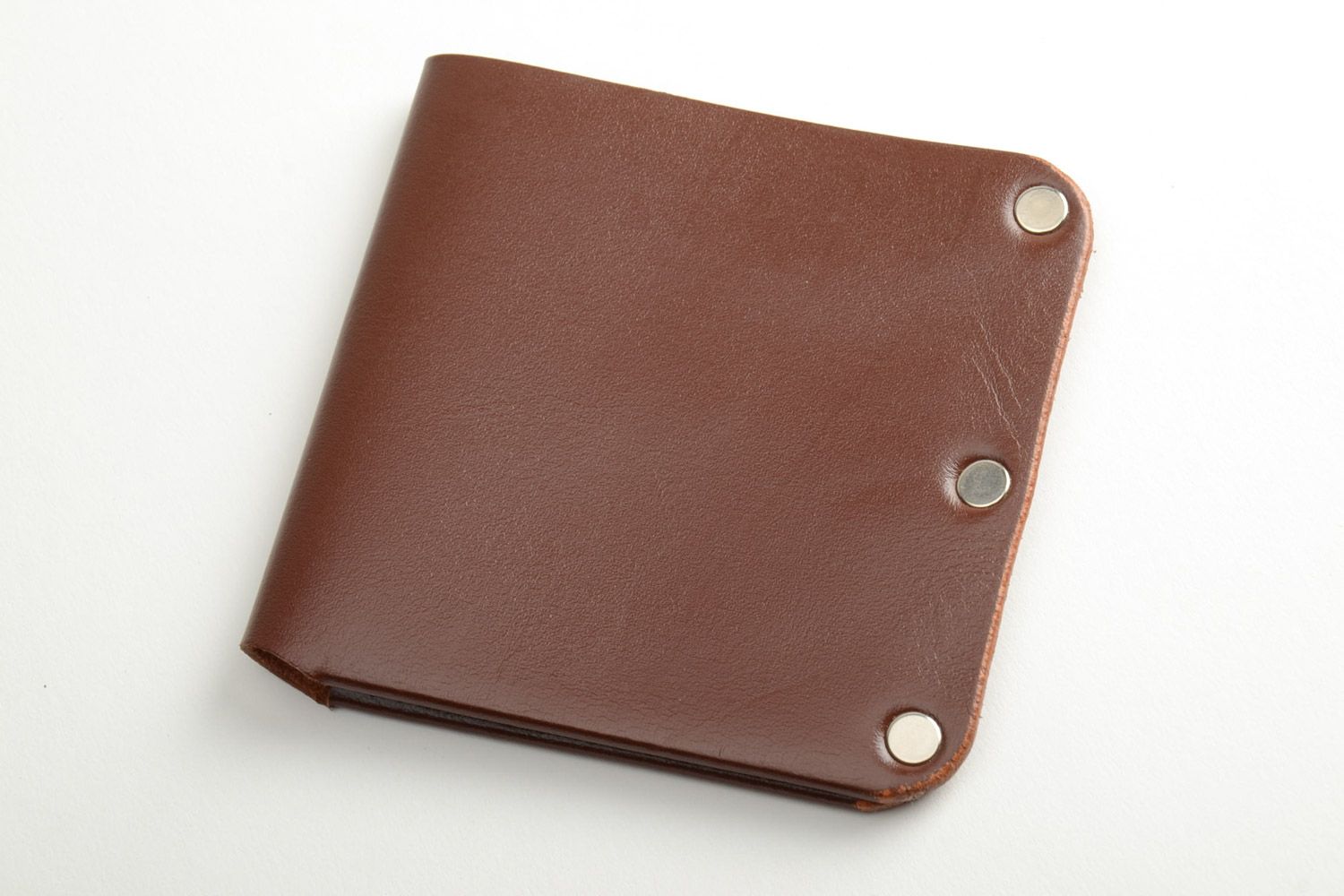 Men's wallet hand made of genuine leather of brown color with metal fittings photo 2