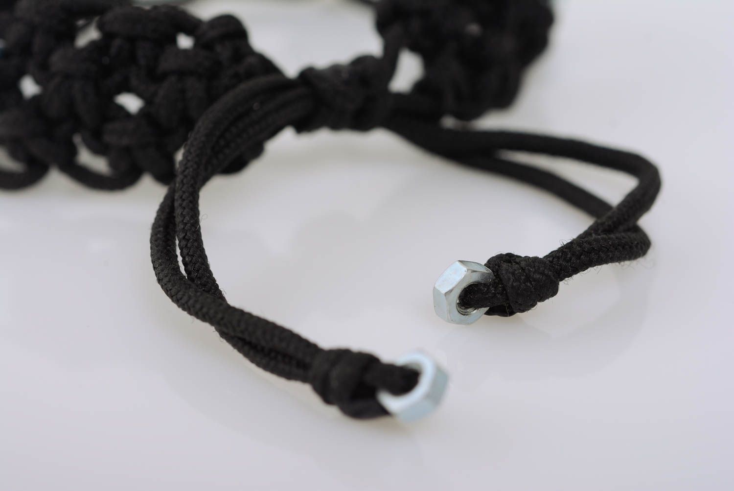 Handmade black macrame woven cord bracelet with stainless steel nuts photo 5
