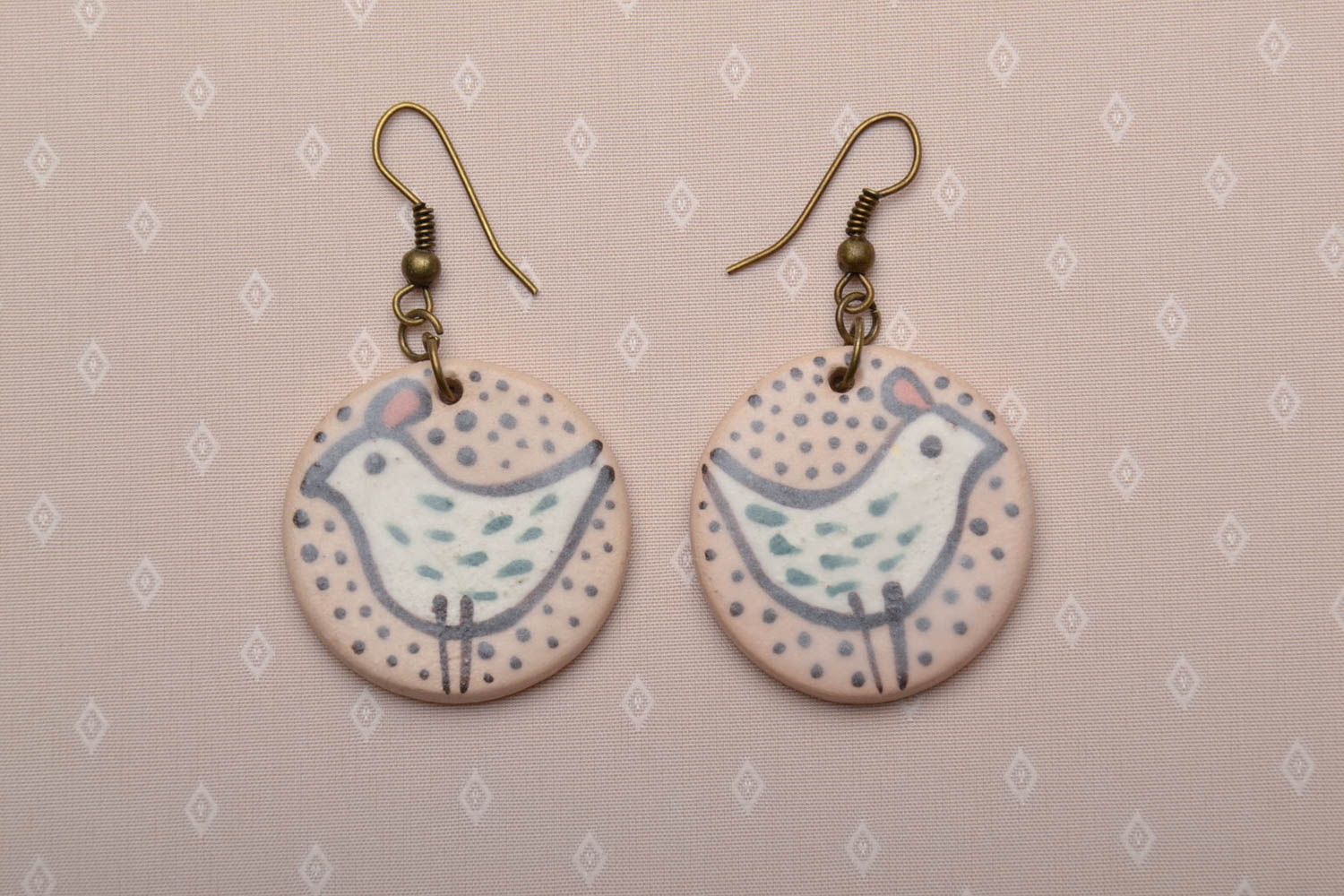 Round ceramic earrings painted with engobes and glaze photo 1