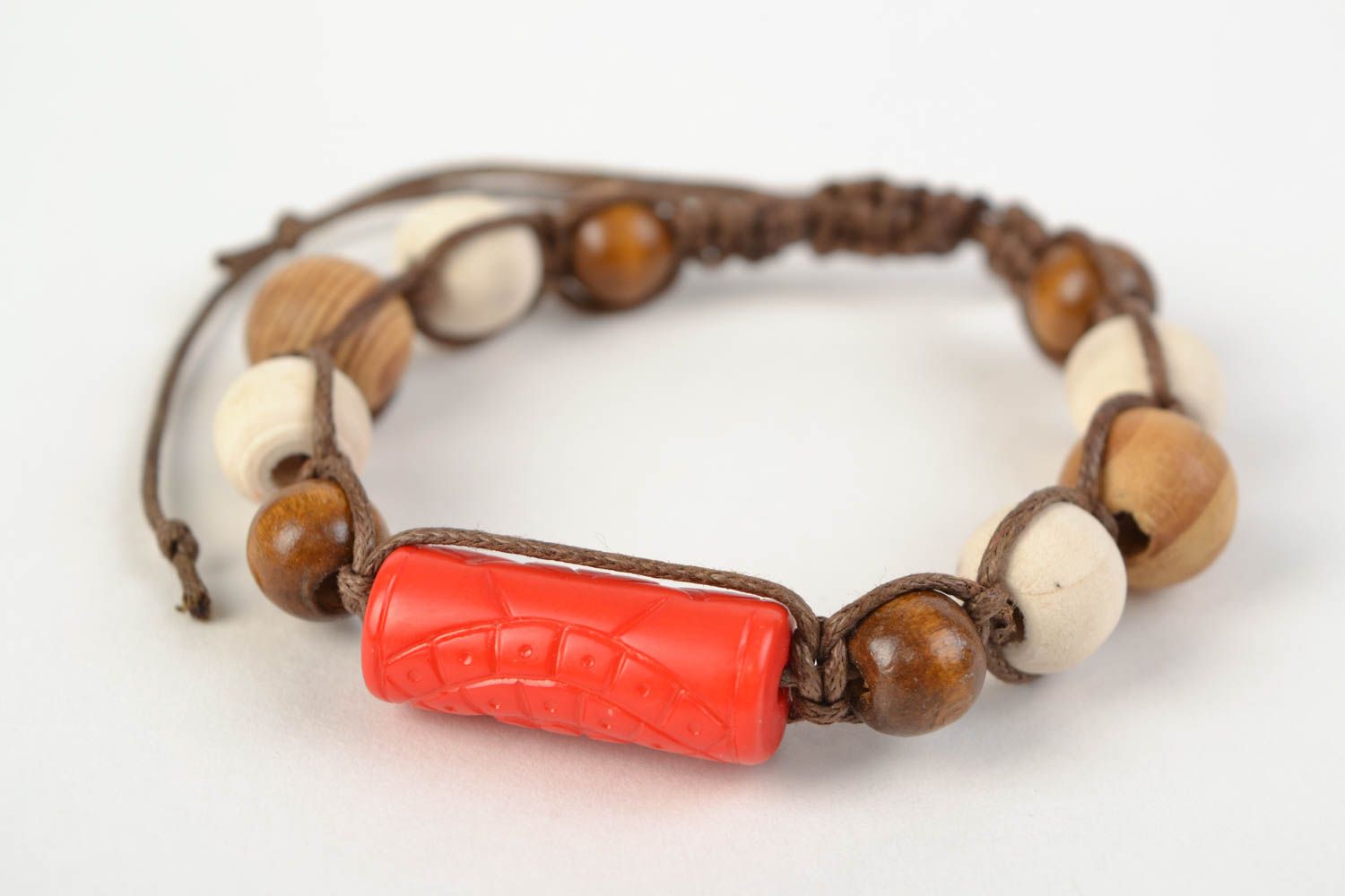 Handmade stylish bracelet with large wooden beads woven of cord red and brown photo 1