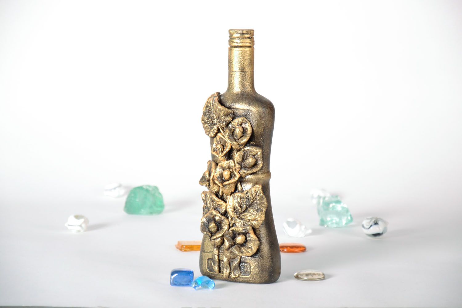 Decorative bottle with flowers photo 1