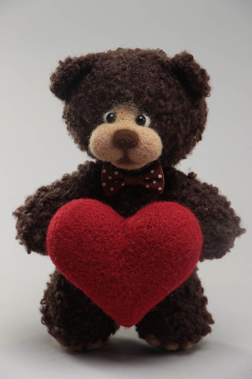 Handmade soft toy crocheted of wool and yarns brown bear with big red heart photo 2