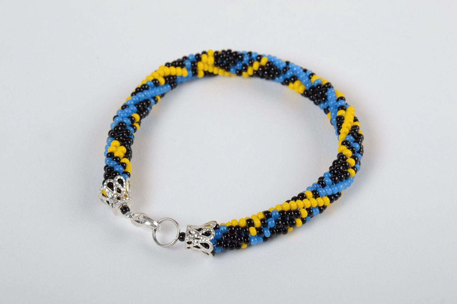 Beautiful bright handmade woven beaded cord bracelet for women photo 2