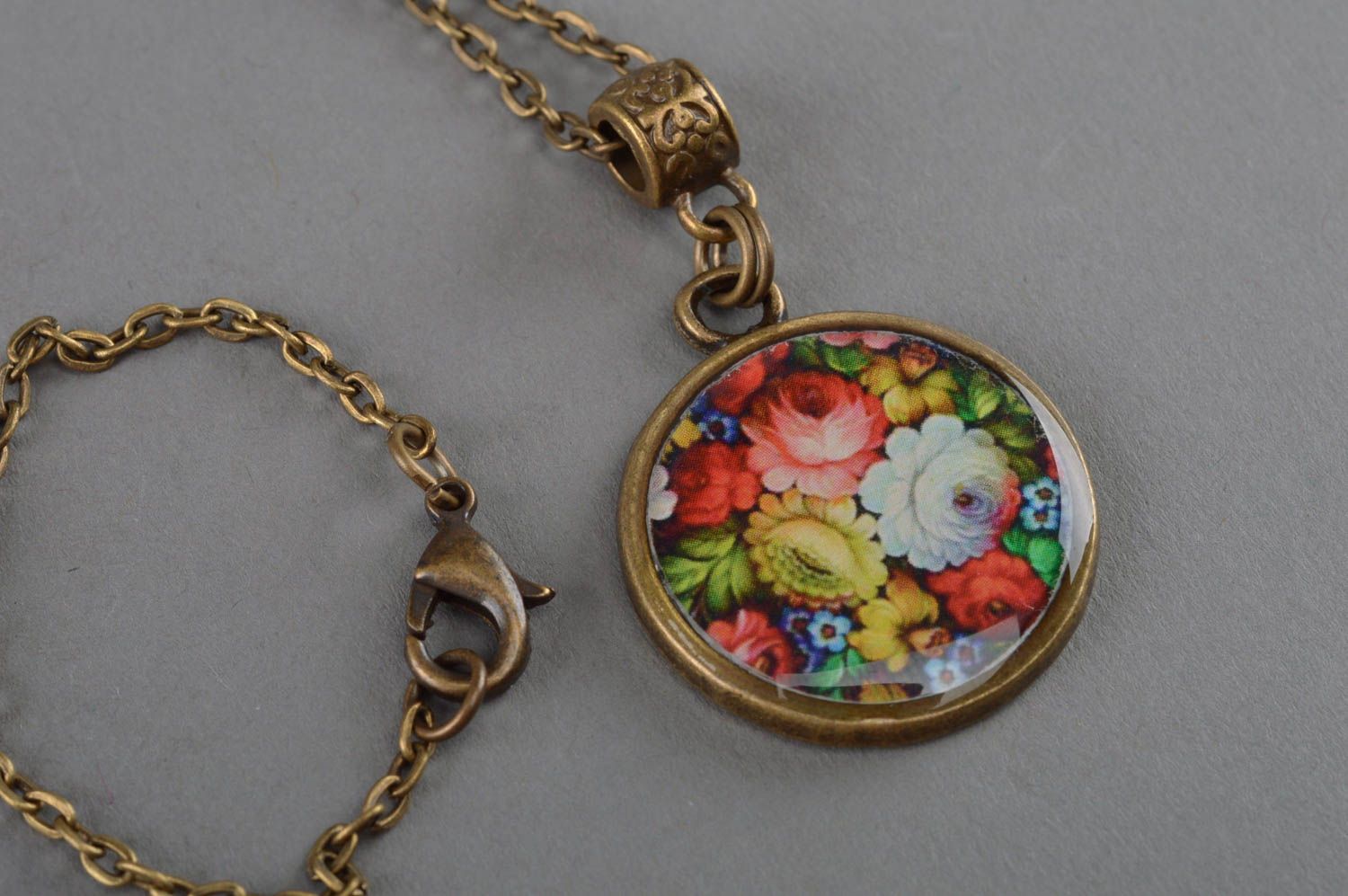 Handmade pendant with jewelry resin and print made using decoupage technique  photo 2
