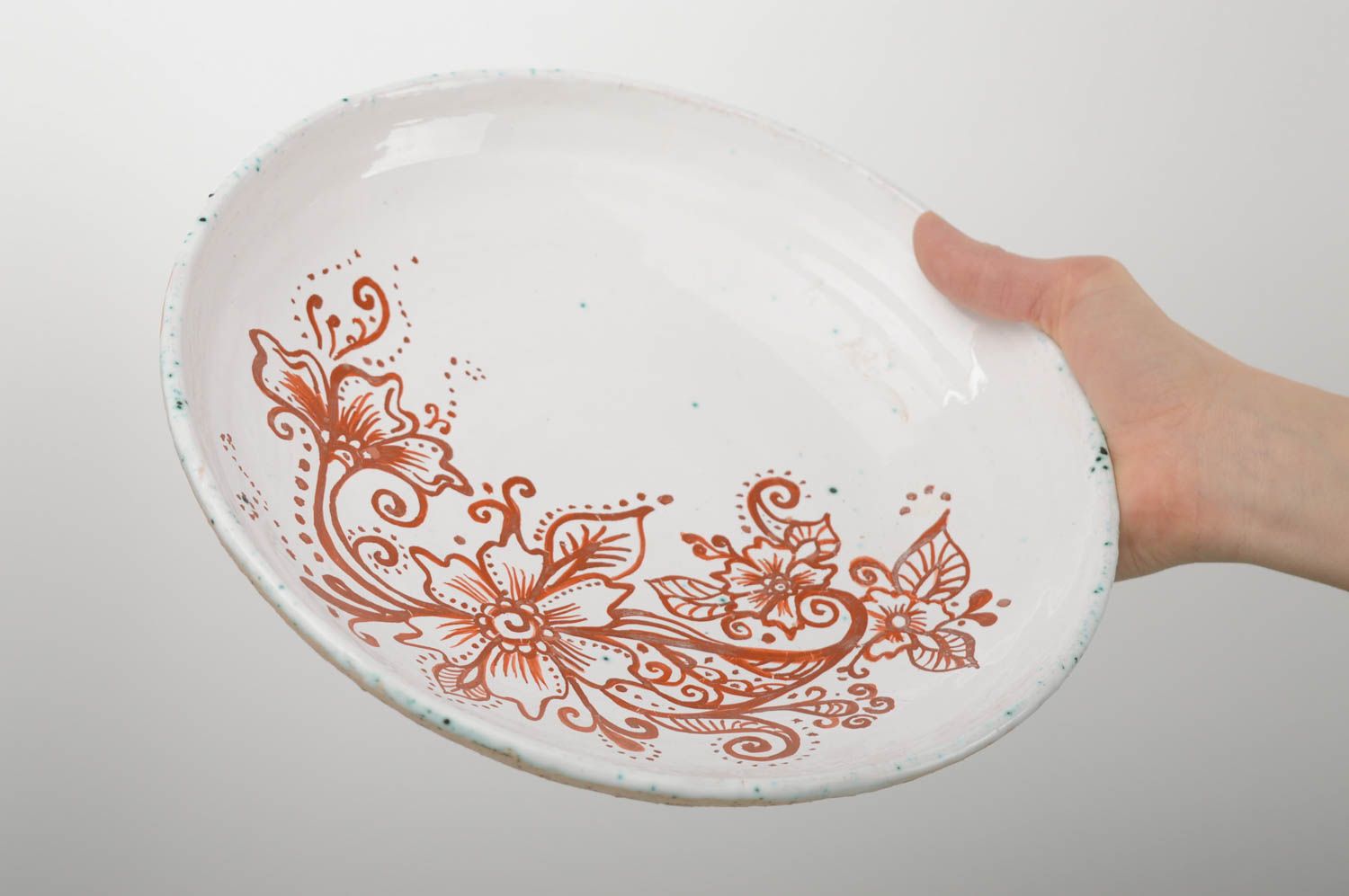 Painted ceramic plate with flowers photo 3