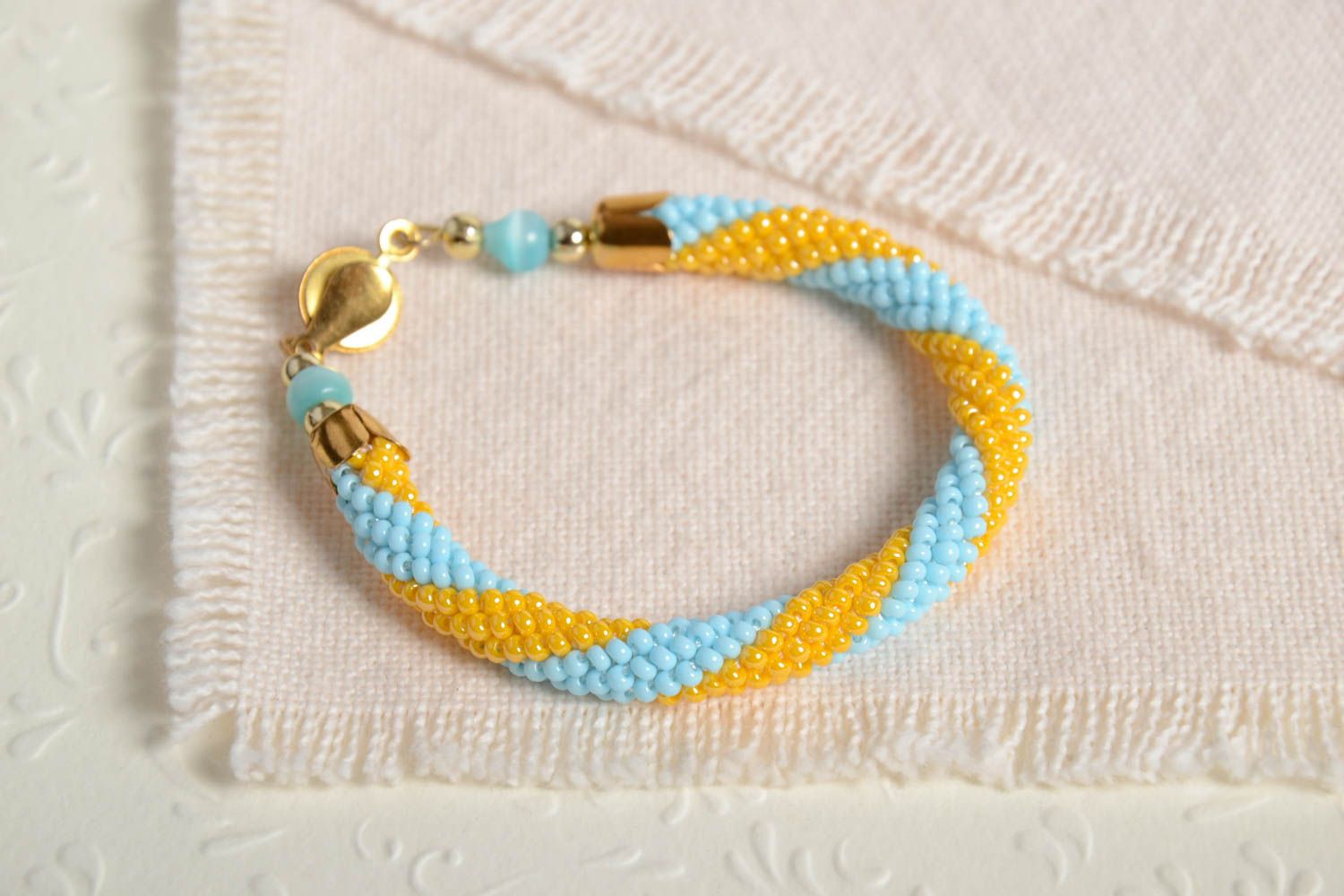 Handmade beaded cord bracelet in yellow and blue colors for women  photo 1